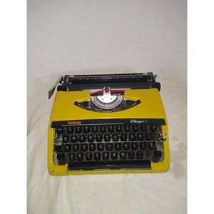 Yellow 1980s Brother Charles 11 manual typewriter